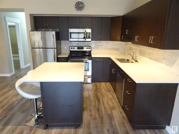 Property Photo:  10518 113 Street NW 108  AB T5H 0C6 