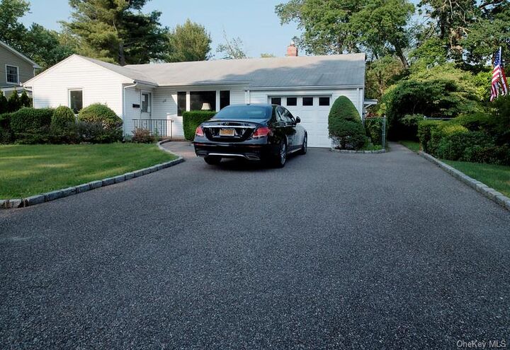 Property Photo: 408 Ackerson Boulevard NY 11718