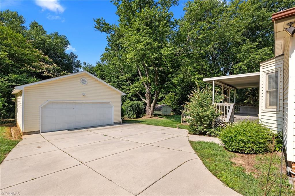 Property Photo:  5711 Greenview Drive  NC 27409 
