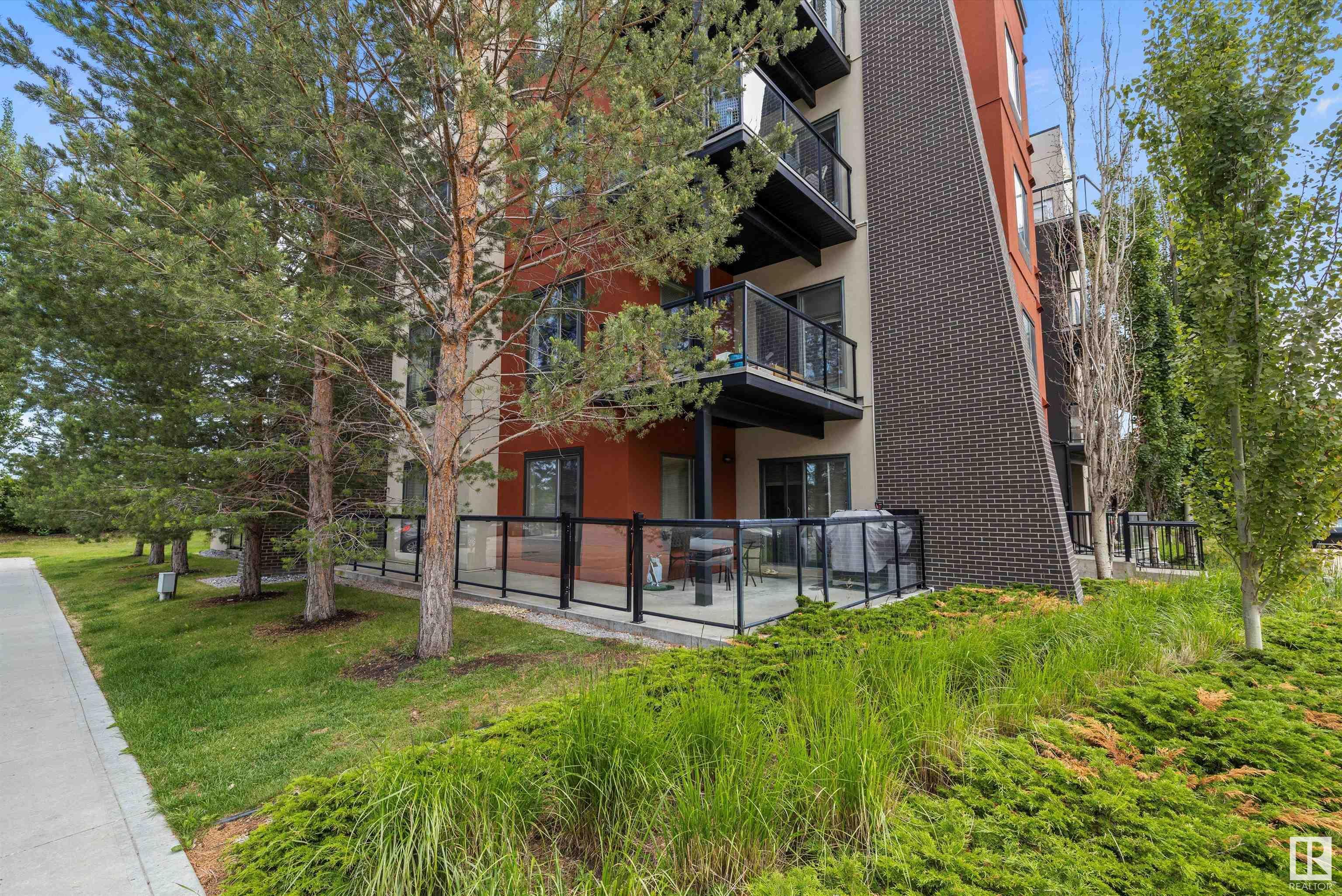 Property Photo: 304 Ambleside Link SW 127 AB T6W 0V2