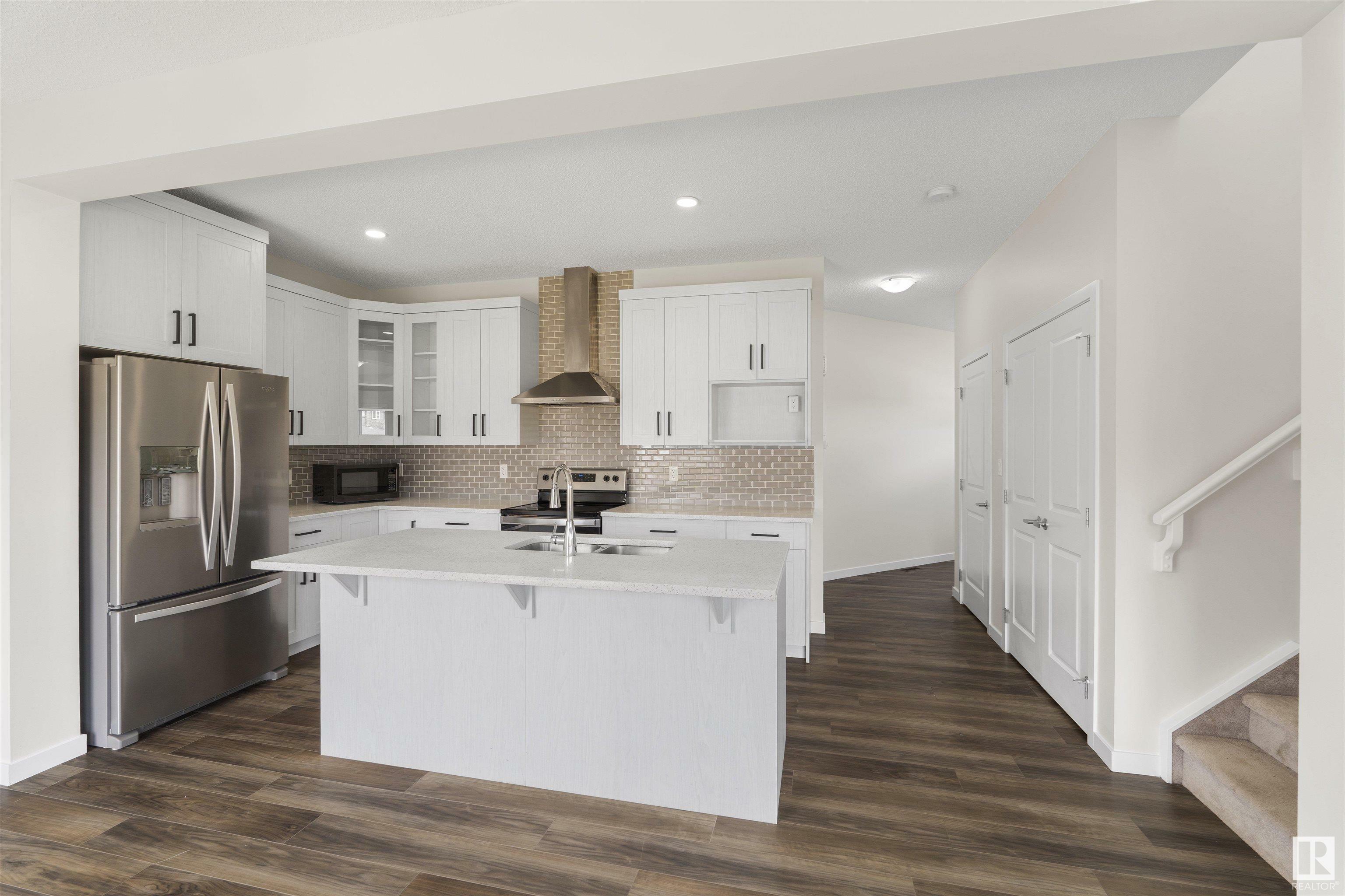 Property Photo: 3303 Checknita Common SW AB T6W 4E8