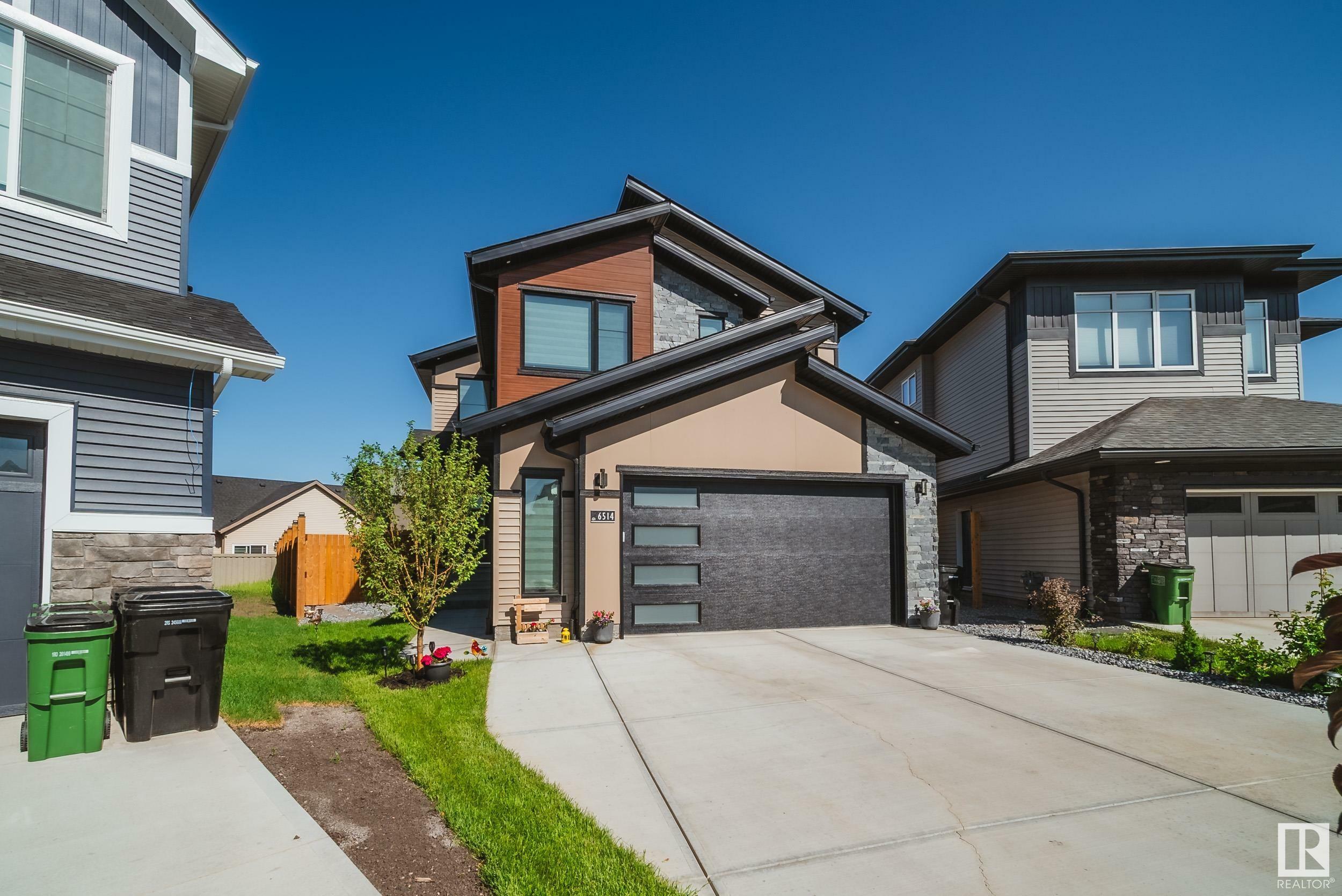 Property Photo: 6514 Crawford Place SW AB T6W 3Y6