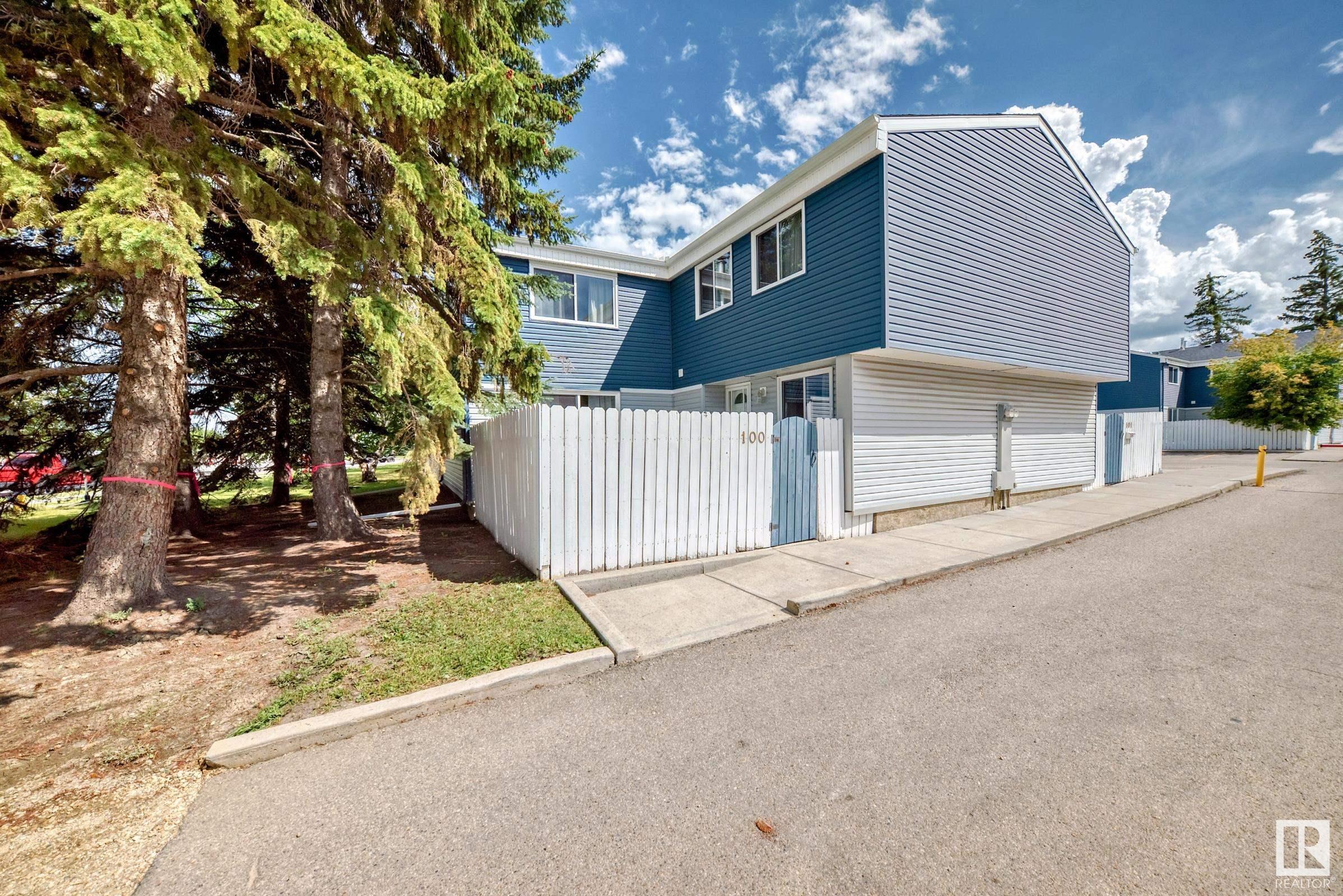 Property Photo: 14707 53 Avenue NW 100 AB T6H 5C9