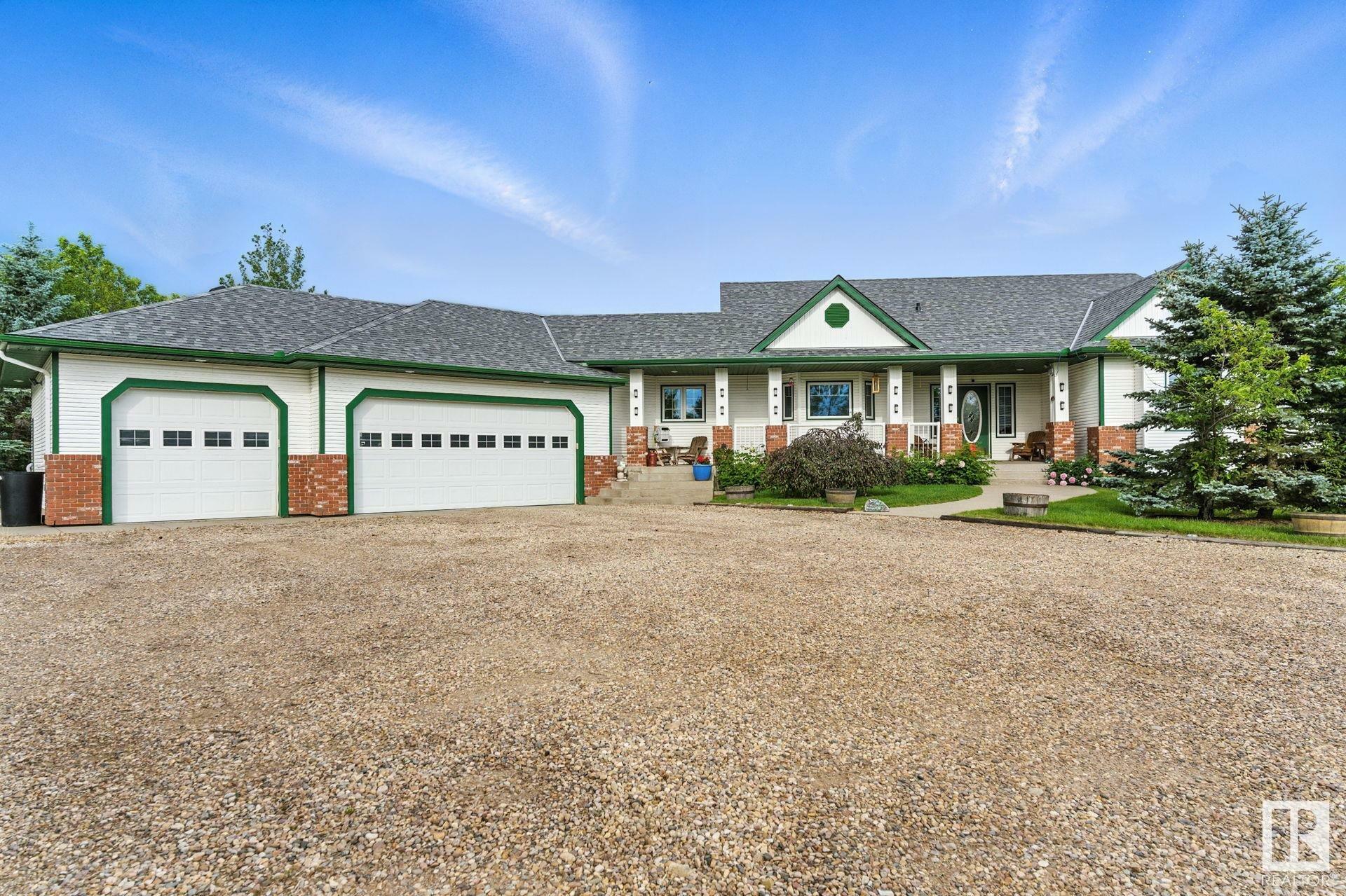 Property Photo: 49317 Rge Road 245 AB T4X 2P8