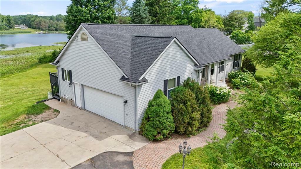 Property Photo: 145 E Huff Lake Court MI 48462 8539