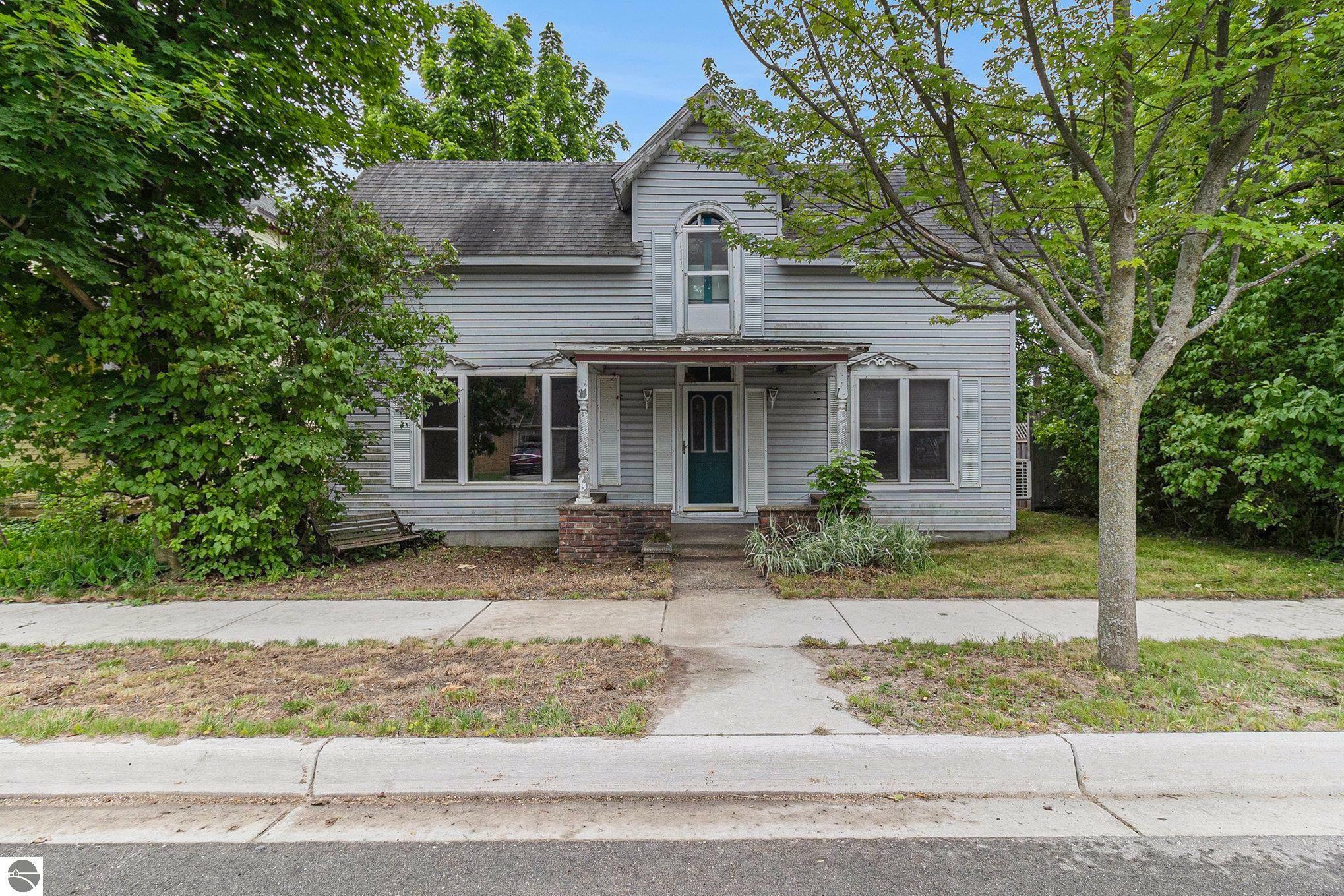 Property Photo:  718 Forest Avenue  MI 49635 