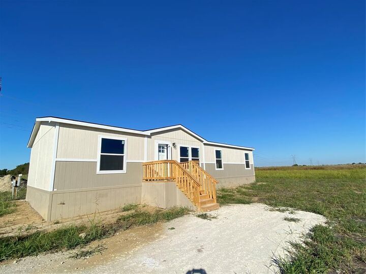 Property Photo: 7740 NW County Road 1200 TX 75102