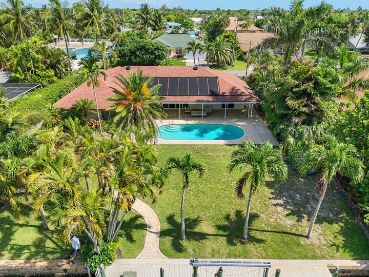 Property Photo:  8318 SE Coconut Street  FL 33455