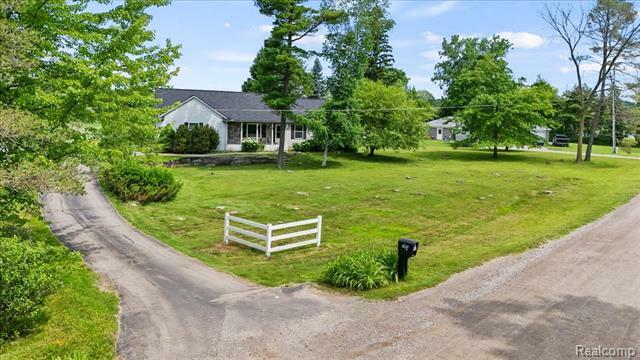 Property Photo: 145 E Huff Lake Court MI 48462