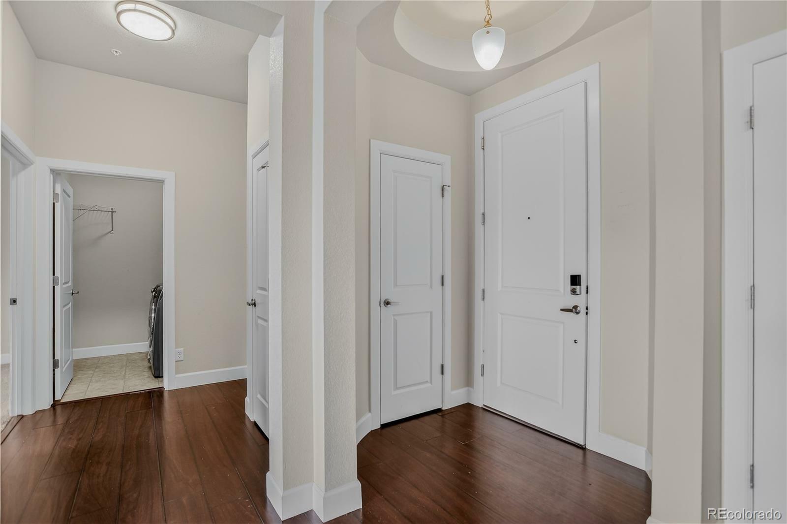 Property Photo:  303 Inverness Way 201  CO 80112 