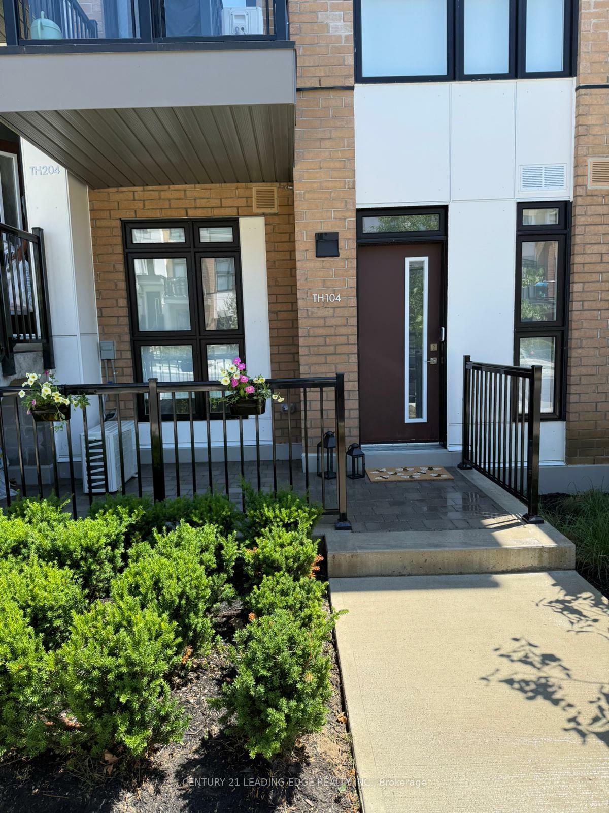 Property Photo:  145 Canon Jackson Drive Th104  ON M6M 0E1 