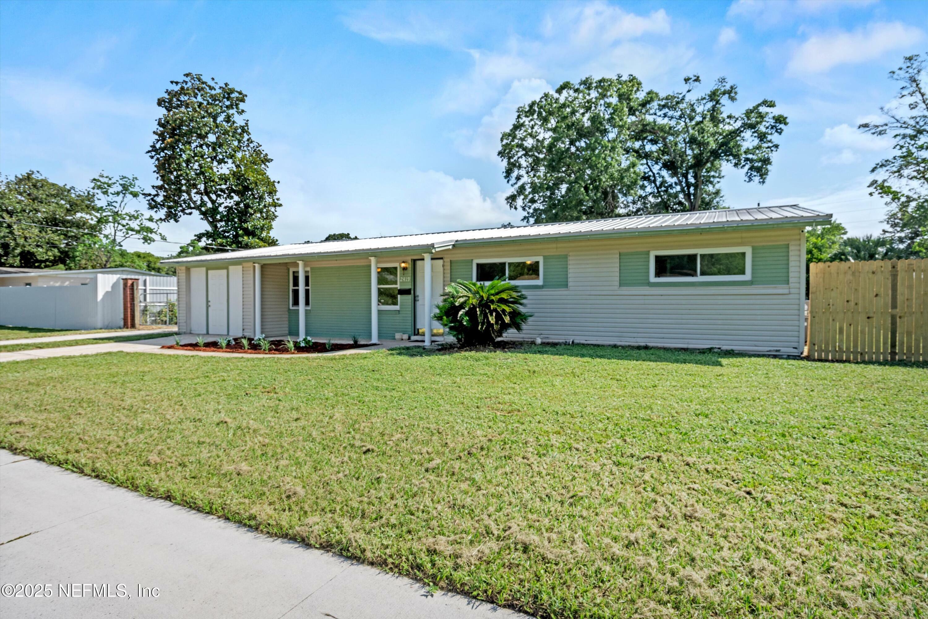 Property Photo:  2419 Burlingame Drive W  FL 32211 