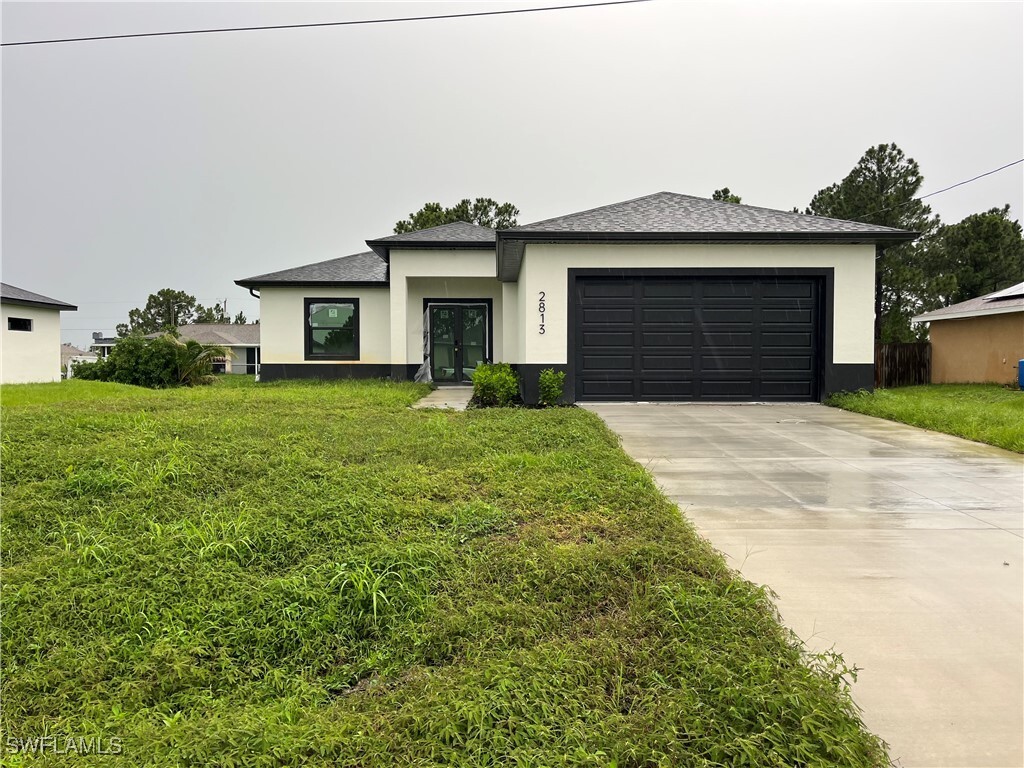 Property Photo: 2813 27th Street SW FL 33976