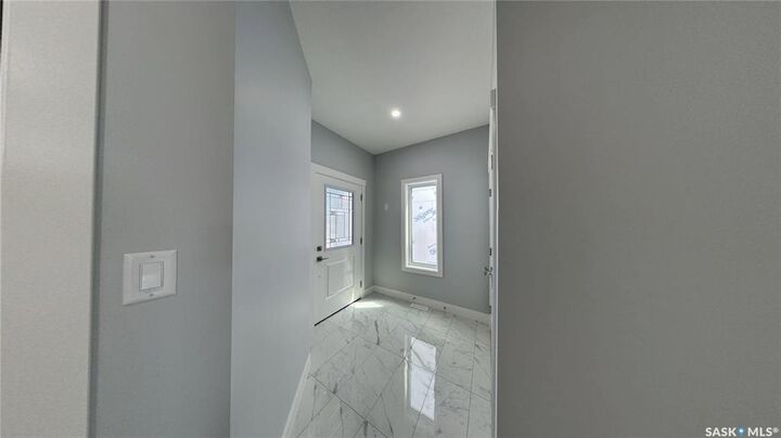 Property Photo: 513 Sharma Crescent SK S7W 0Y1