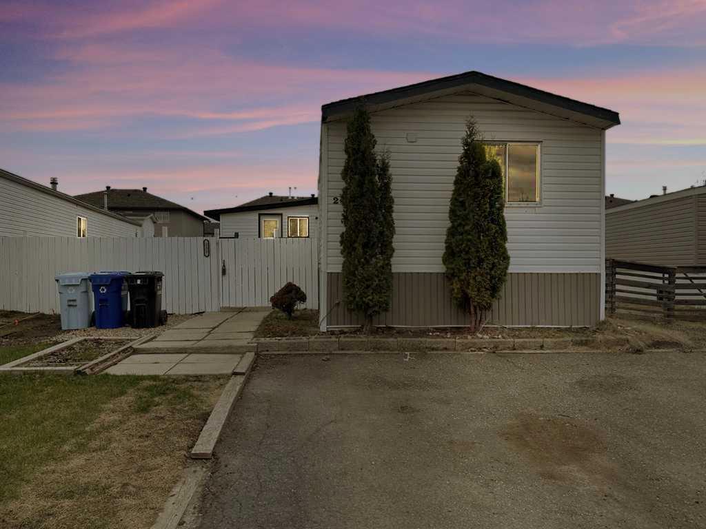 Property Photo: 232 Caouette Crescent AB T9K 2H9