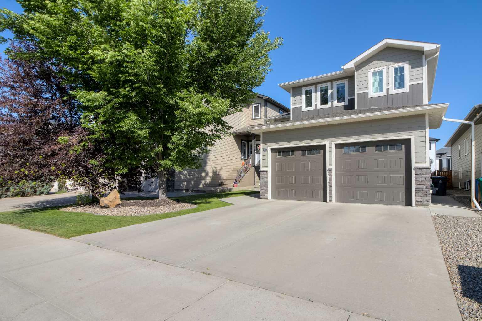 Property Photo: 611 Sixmile Crescent S AB T1K 5W8