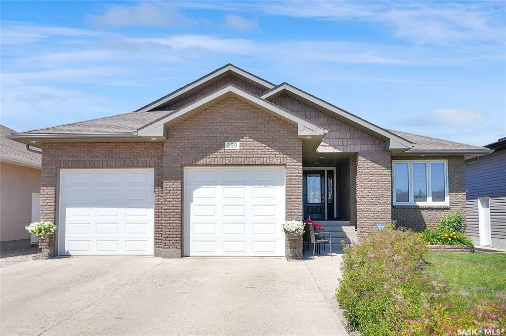Property Photo: 289 Wood Lily Drive SK S6J 1N9