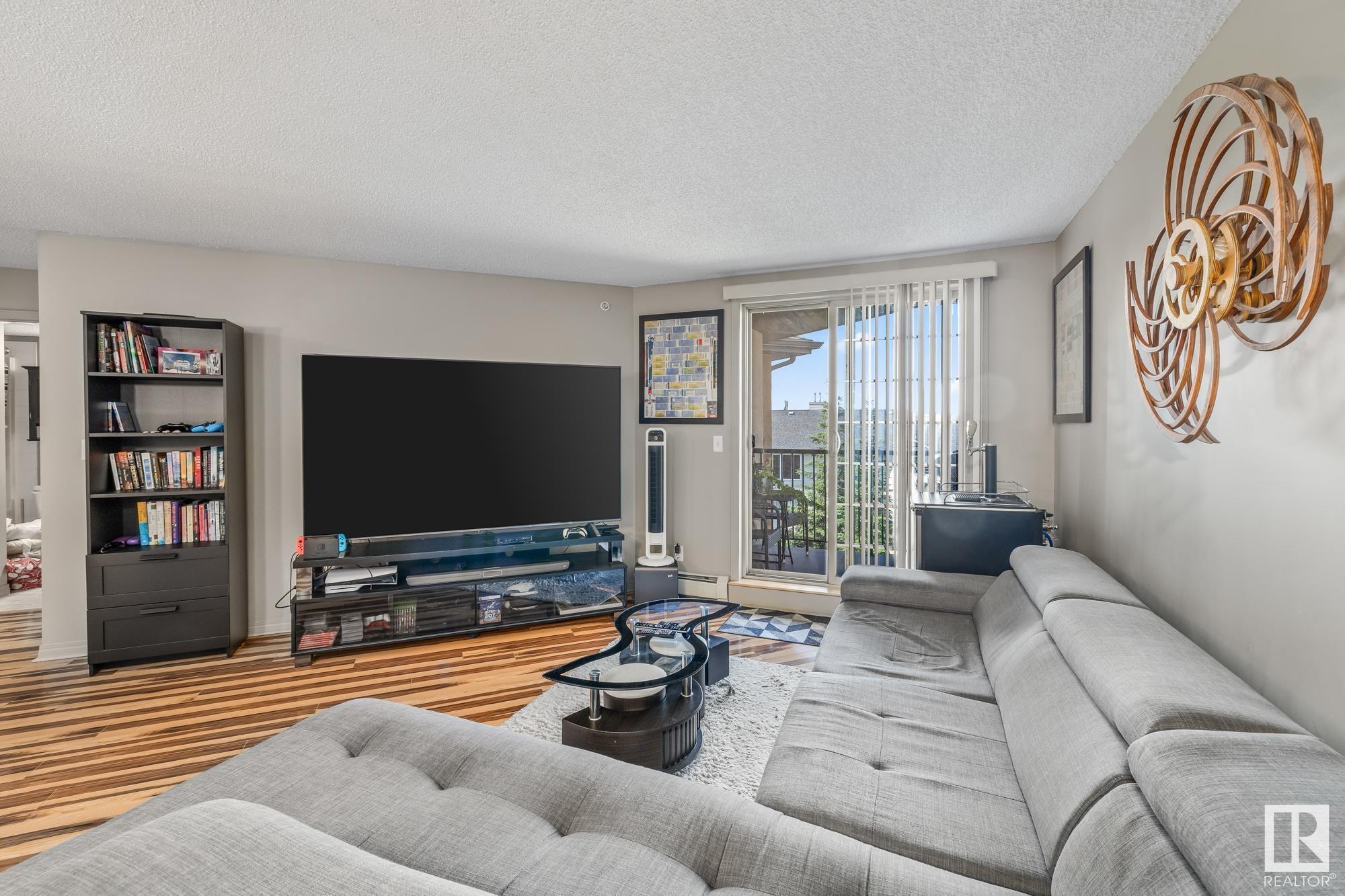Property Photo: 11449 Ellerslie Road SW 412 AB T6W 1T2