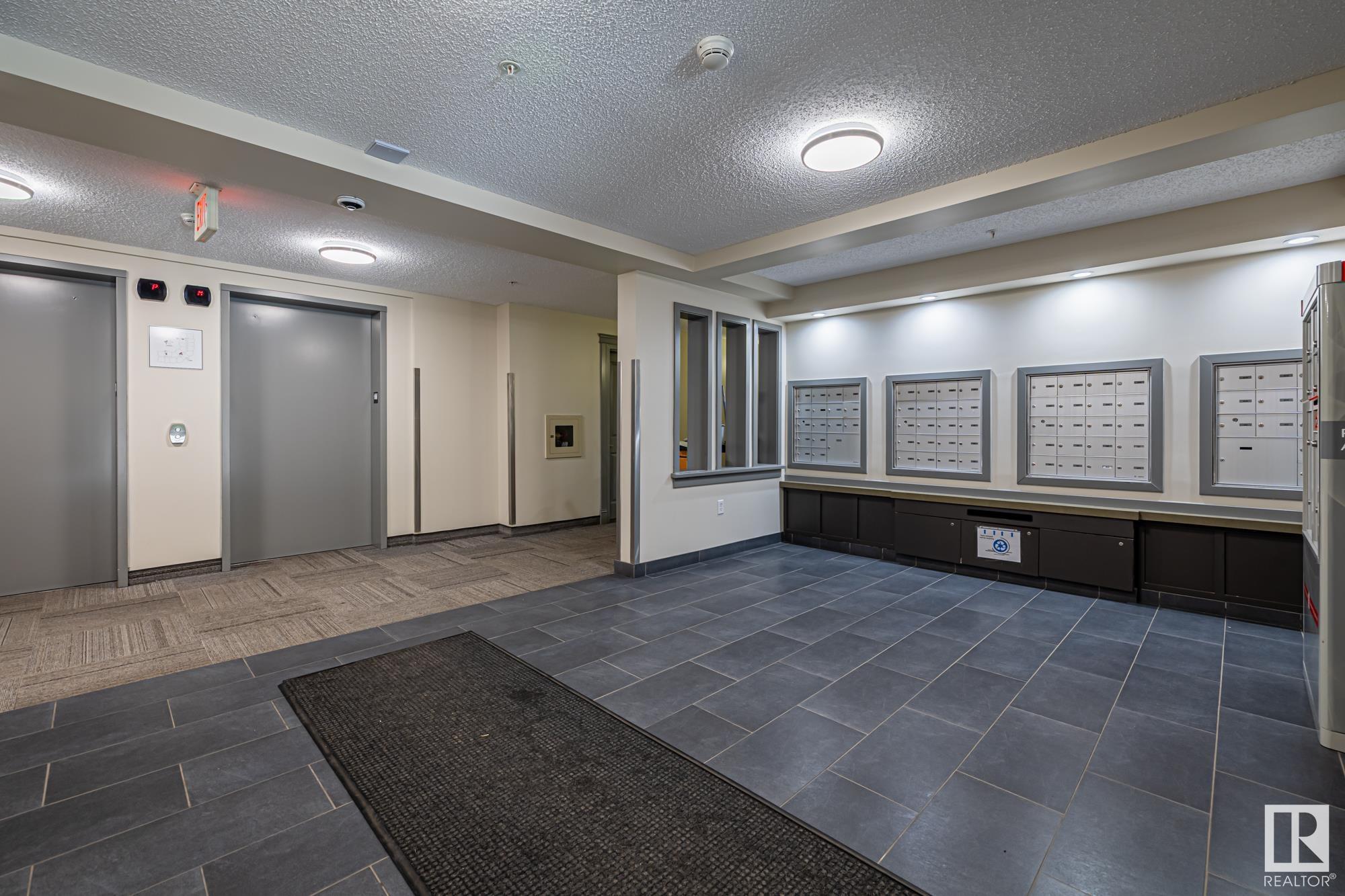 Property Photo: 11449 Ellerslie Road SW 412 AB T6W 1T2