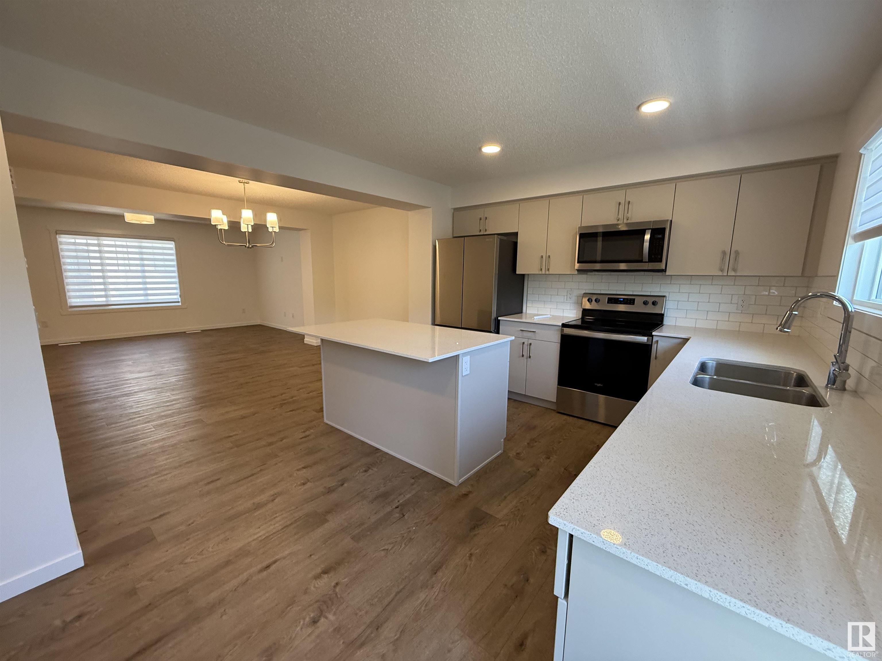 Property Photo: 50 McLaughlin Drive 17 AB T7X 0E1
