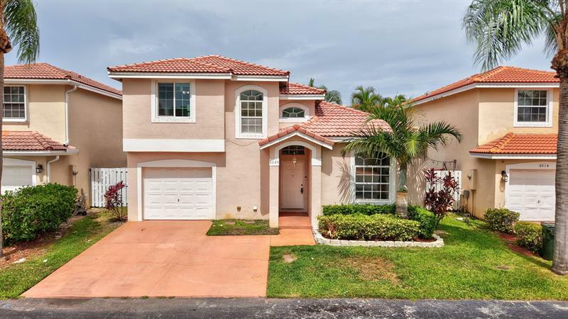 Property Photo: 6024 NW 45th Way FL 33073