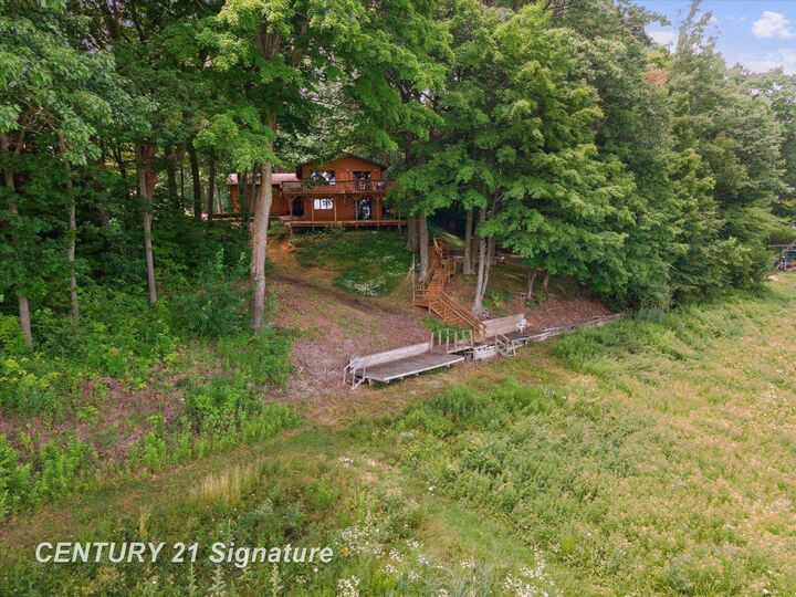 Property Photo:  5092 N Lake Sanford Road  MI 48657 