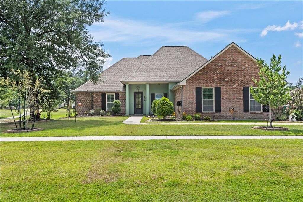 Property Photo:  318 Saw Grass Loop  LA 70435 