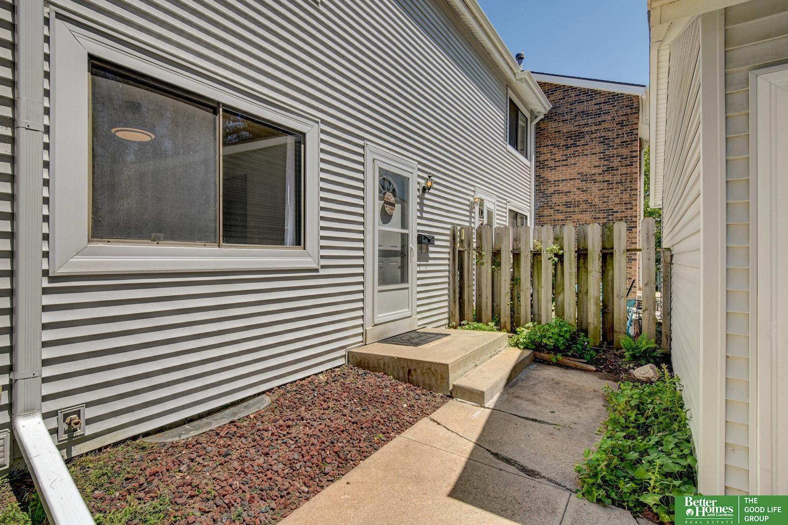 Property Photo: 8724 Granville Parkway NE 68128