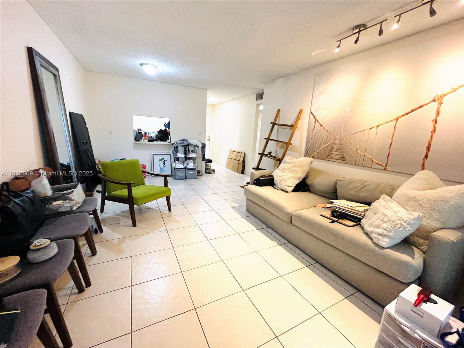 Property Photo: 9974 SW 88th St 1033 FL 33176