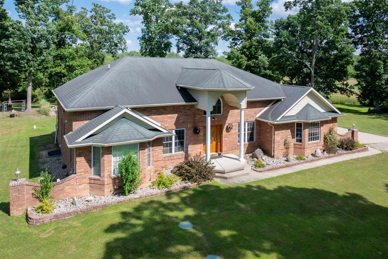 Property Photo: 11605 Dunmaglas Drive MI 48808-9305