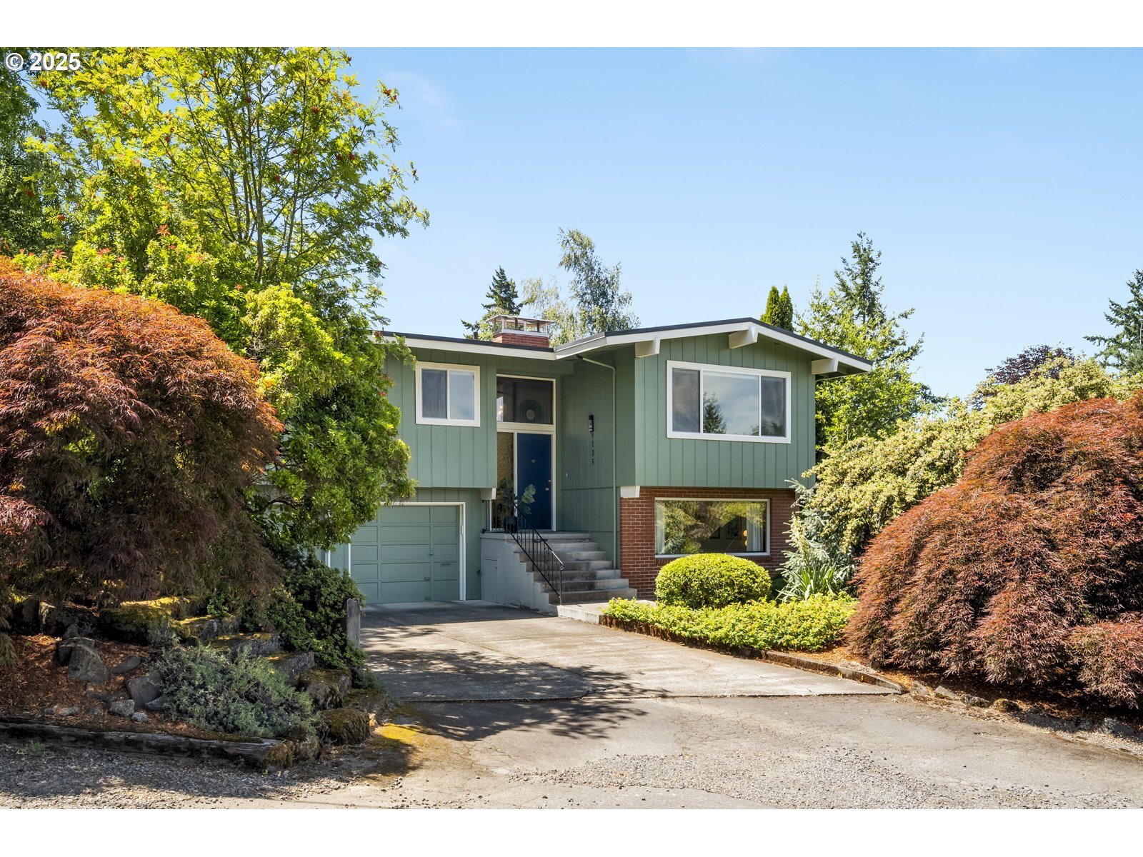 Property Photo:  9135 SW 36th Ave  OR 97219 