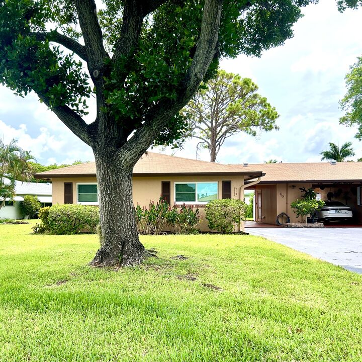 Property Photo:  715 Whippoorwill Lane  FL 33445 