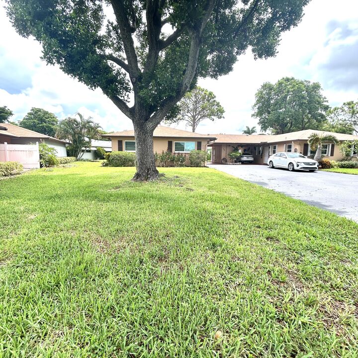 Property Photo: 715 Whippoorwill Lane FL 33445