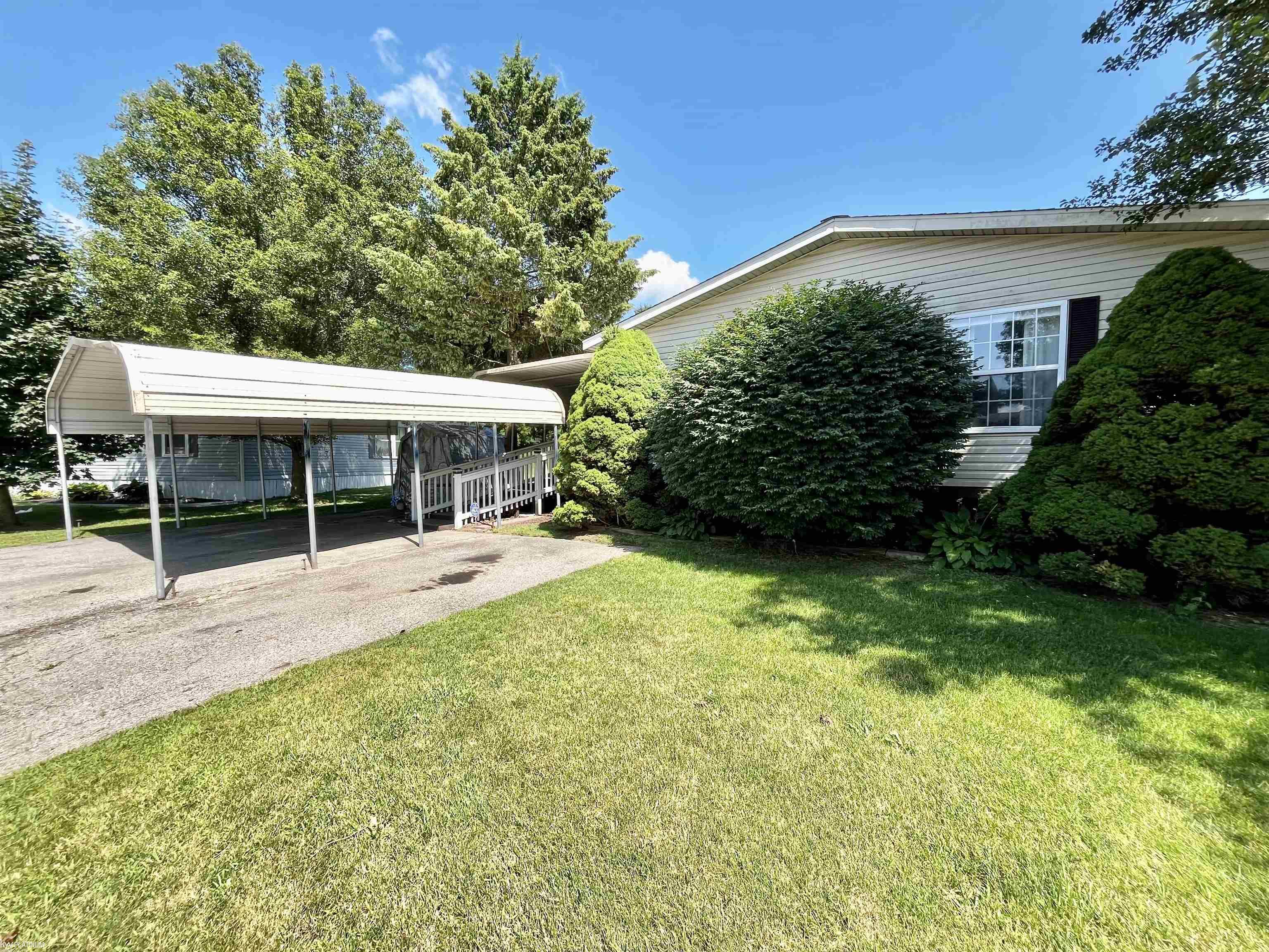 Property Photo: 2500 Mann Road, Lot 83 MI 48346