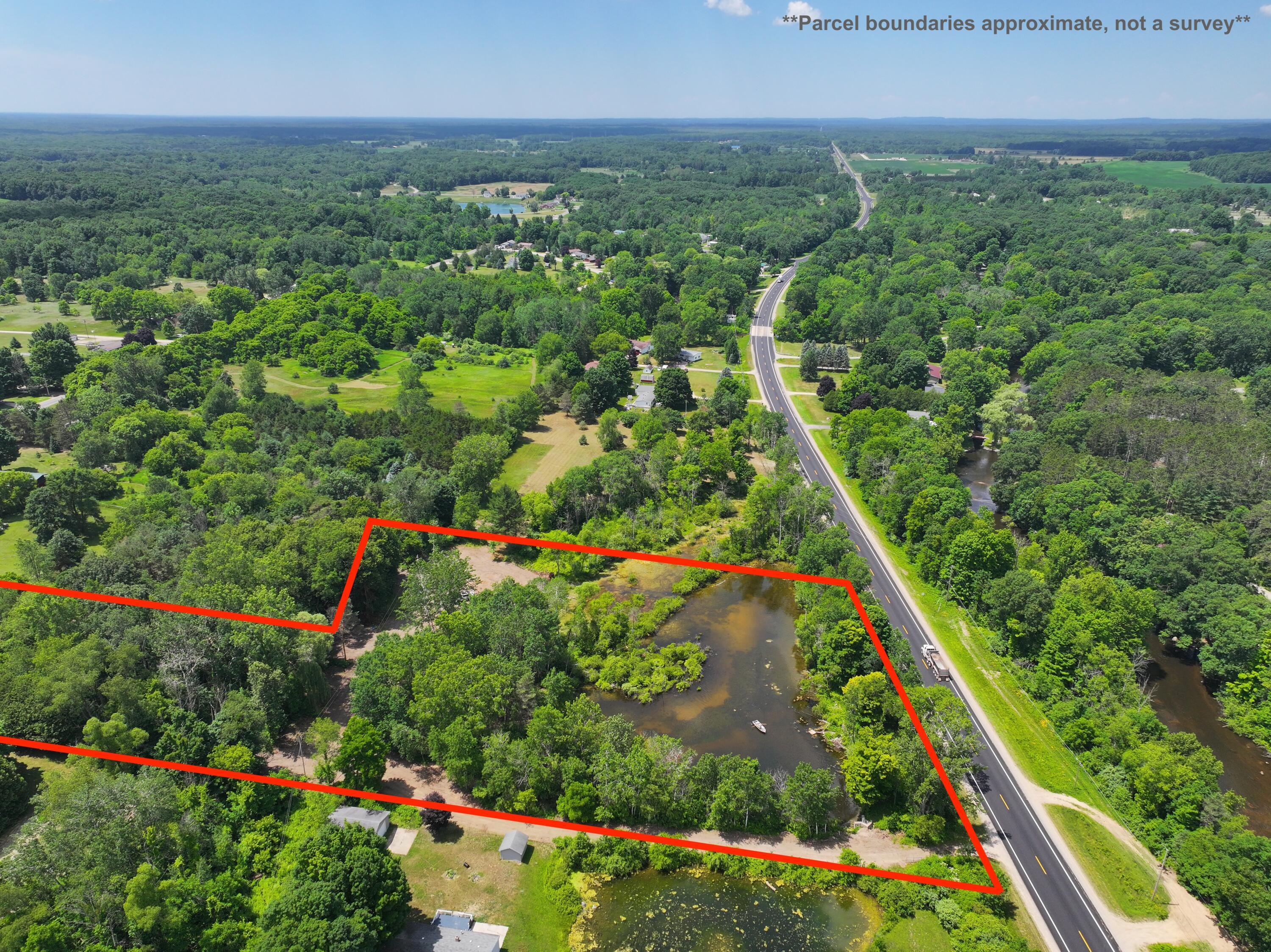 Property Photo: V/L 4.67a E M-20 MI 49421