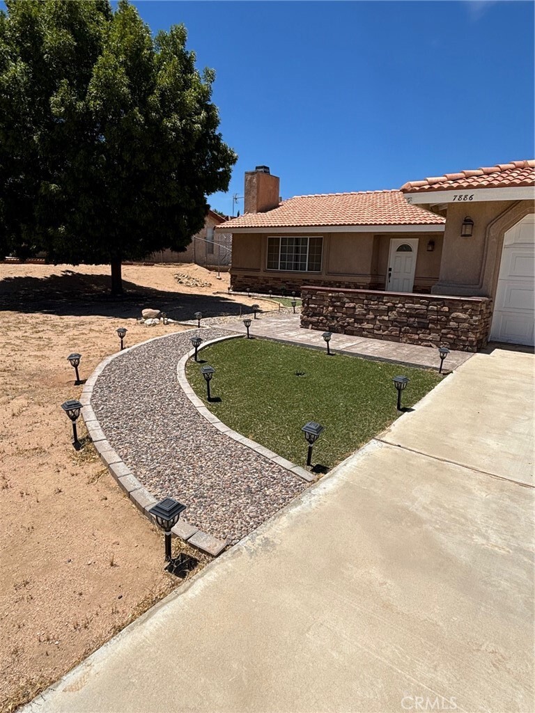 Property Photo:  7886 Pismo Avenue  CA 92345 