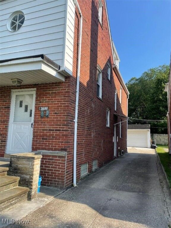 Property Photo:  13698 Cedar  OH 44118 