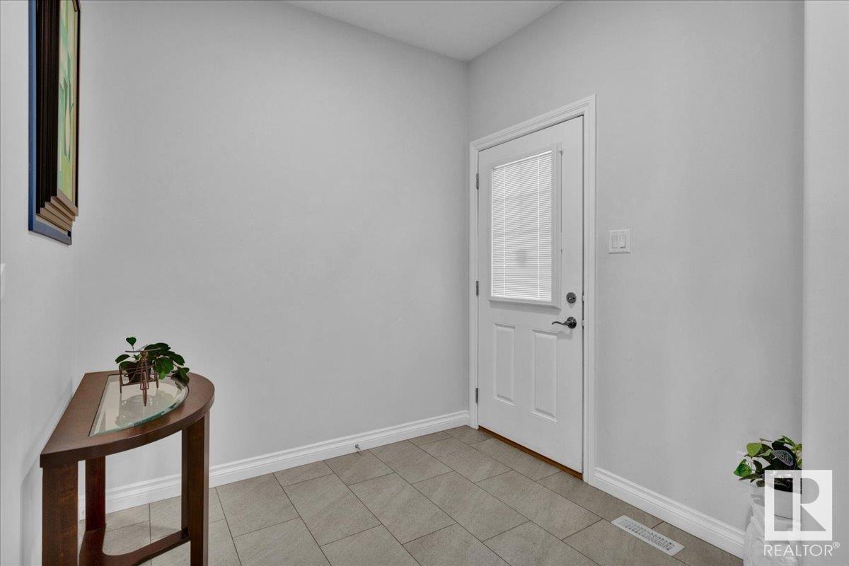 Property Photo:  8708 223 Street NW  AB T5T 7L6 