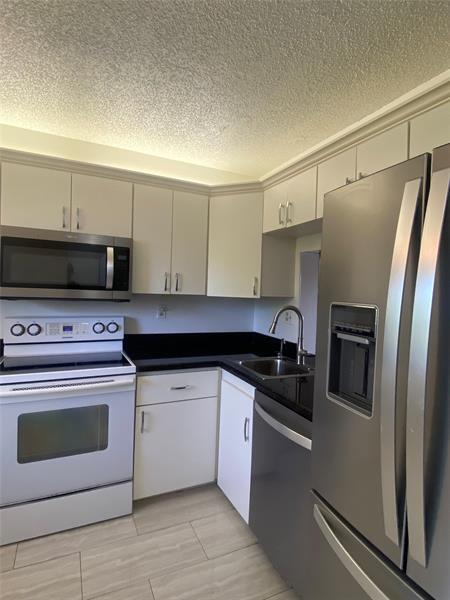 Property Photo: 3000 NW 42nd Ave B408 FL 33066