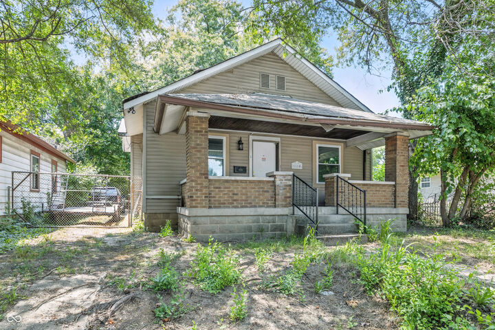Property Photo: 1110 N Tibbs Avenue IN 46222