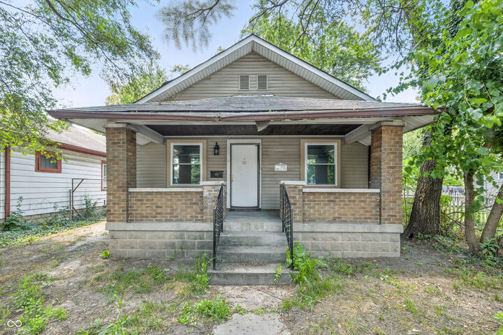 Property Photo:  1110 N Tibbs Avenue  IN 46222 