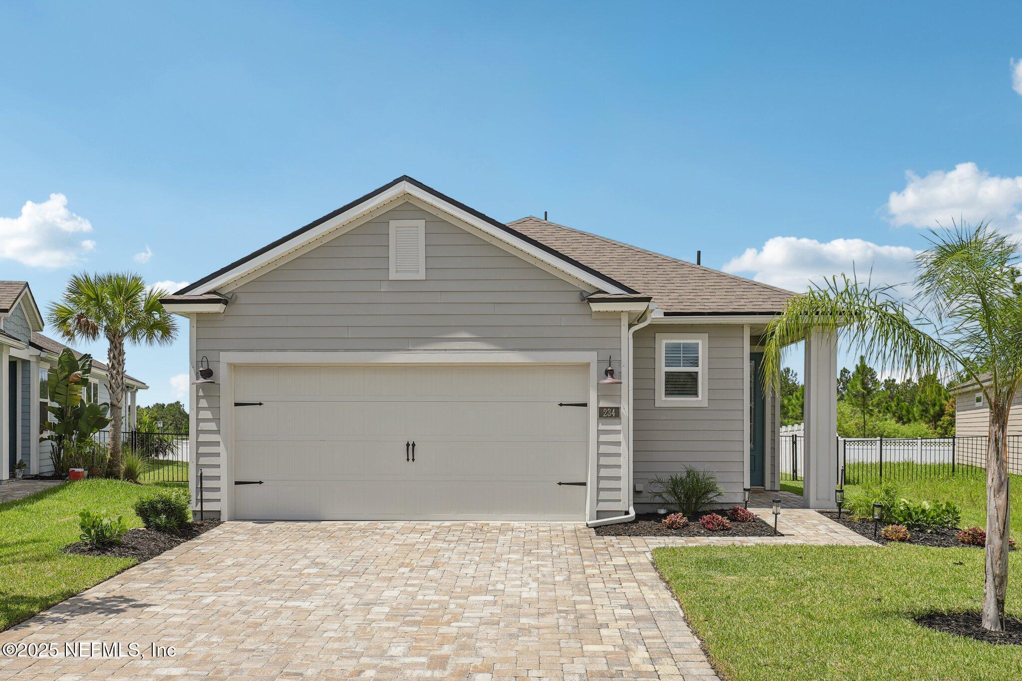 Property Photo: 234 Thistleton Way FL 32092