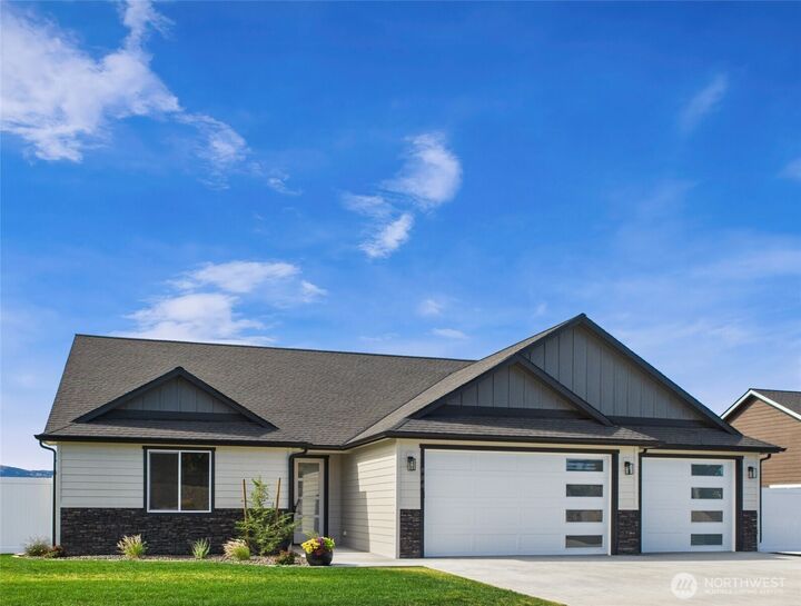 Property Photo:  884 NE Tyler Place  WA 98802 