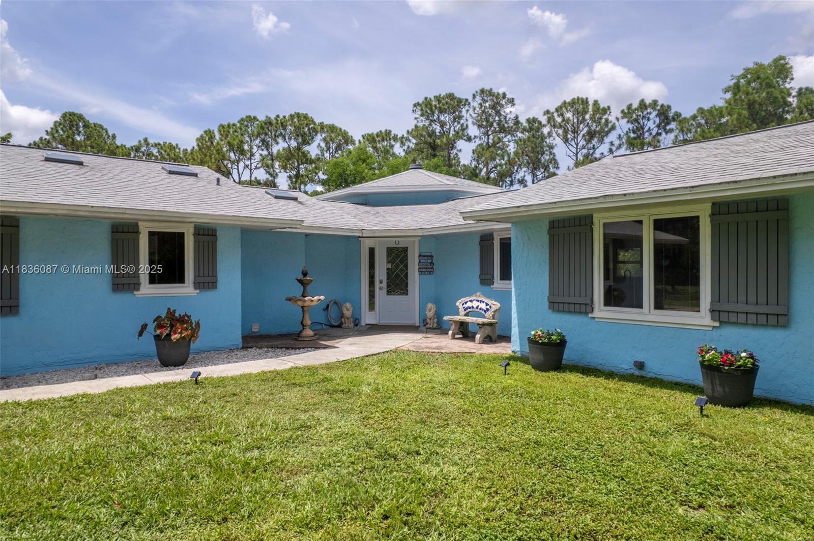 Property Photo: 10709 N 159th Ct N FL 33478