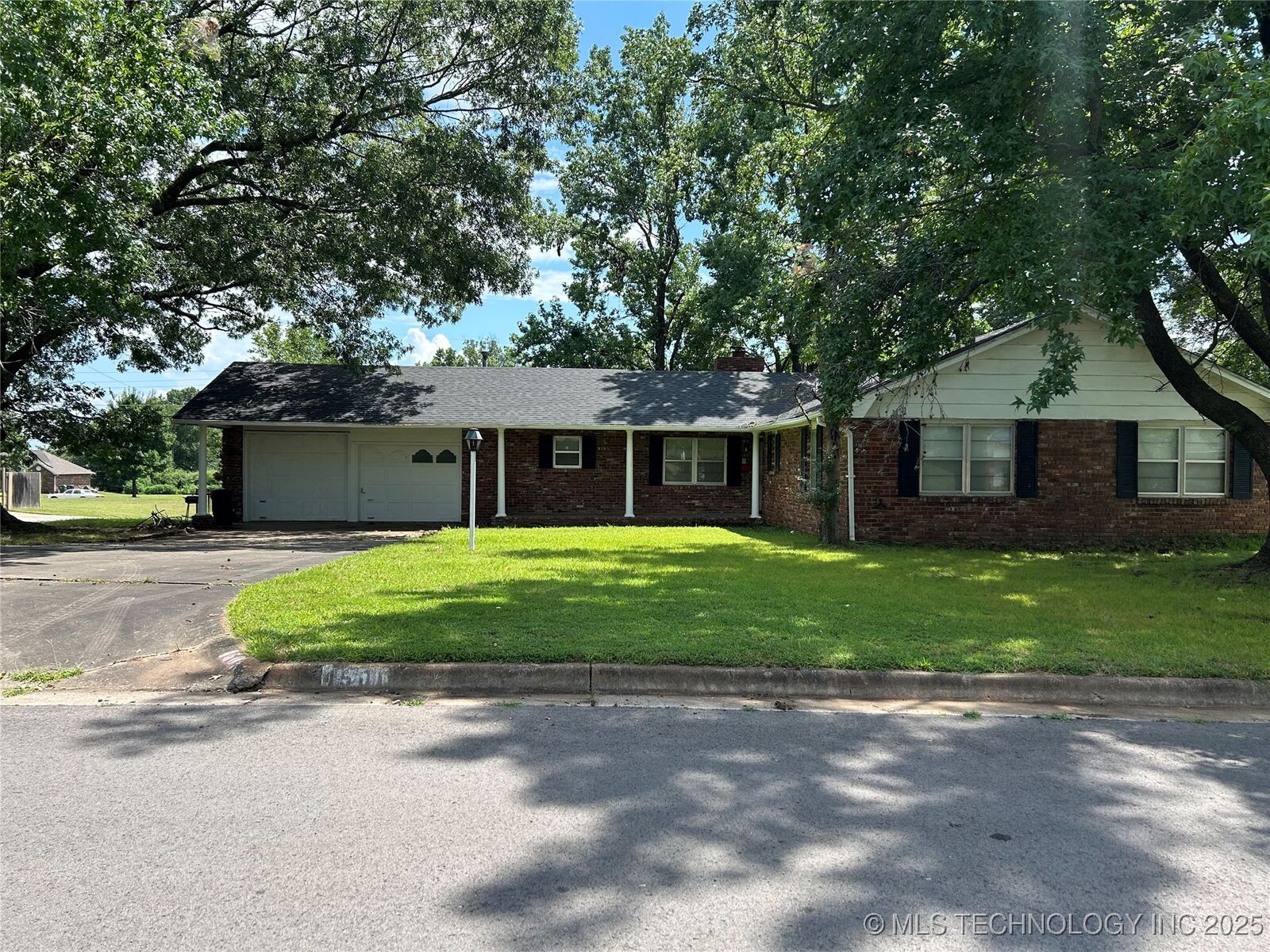 Property Photo:  4501 Denison Street  OK 74401 