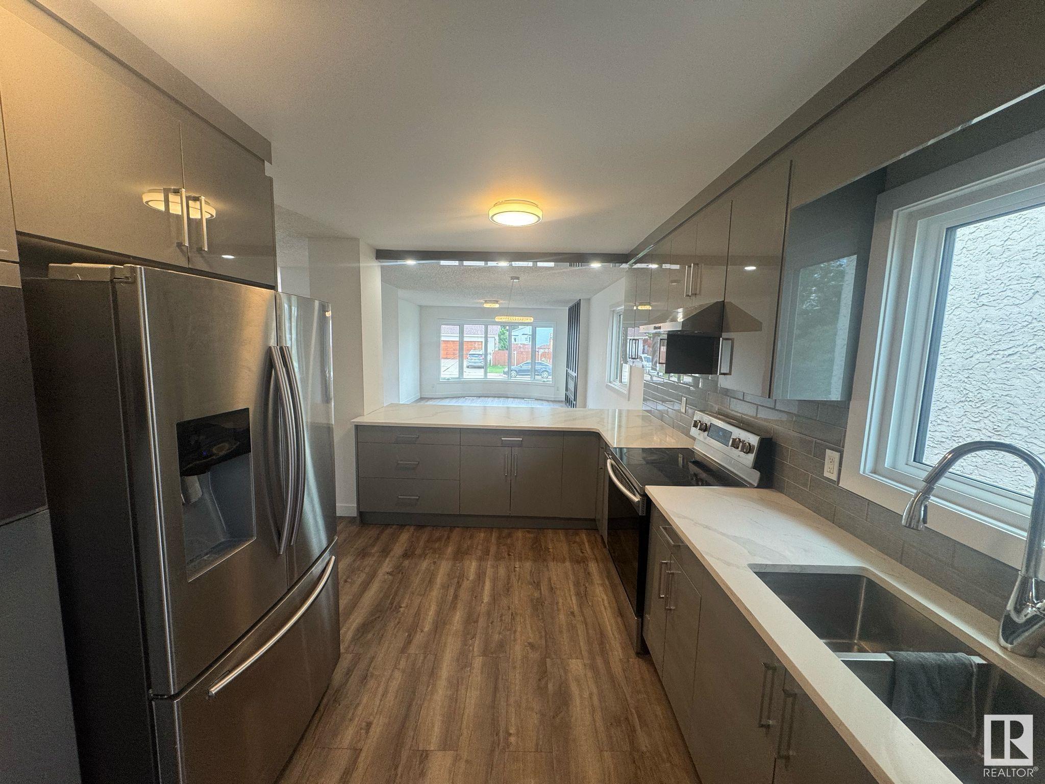 Property Photo:  4516 27 Avenue NW  AB T6L 4P9 