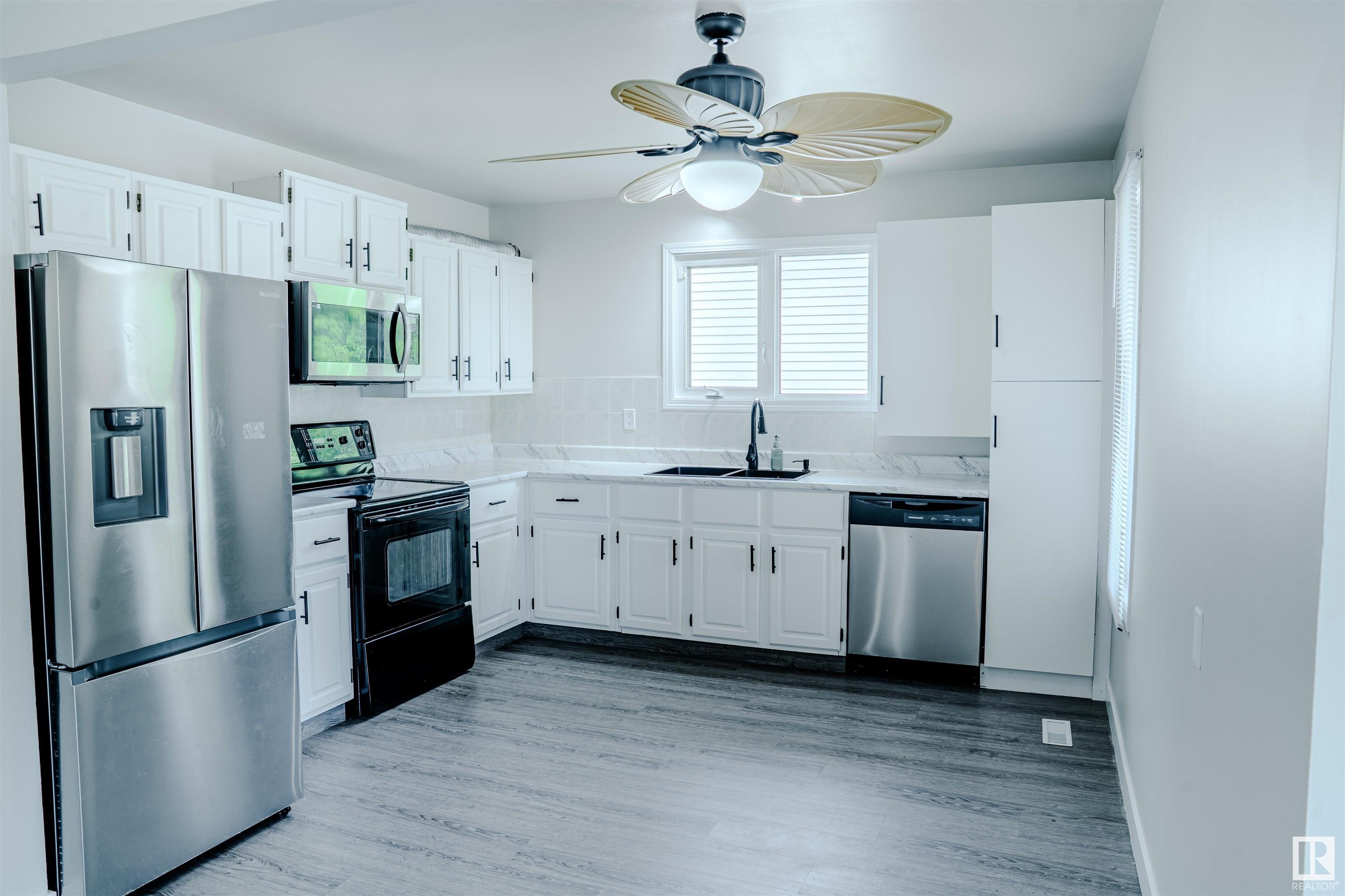 Property Photo: 1240 65 St NW AB T6L 2E7