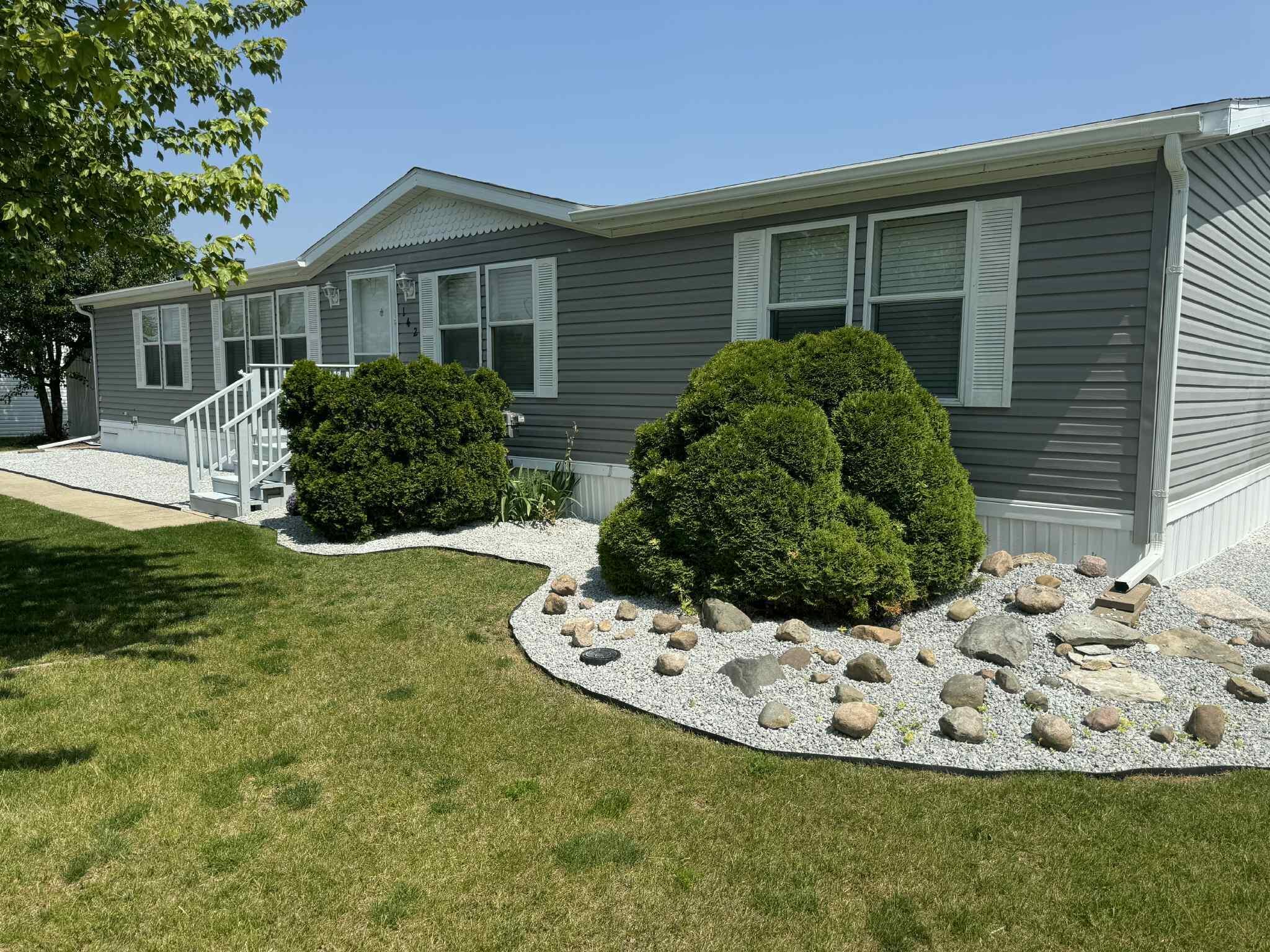 Property Photo: 7204 E Grand River Ave MI 48875