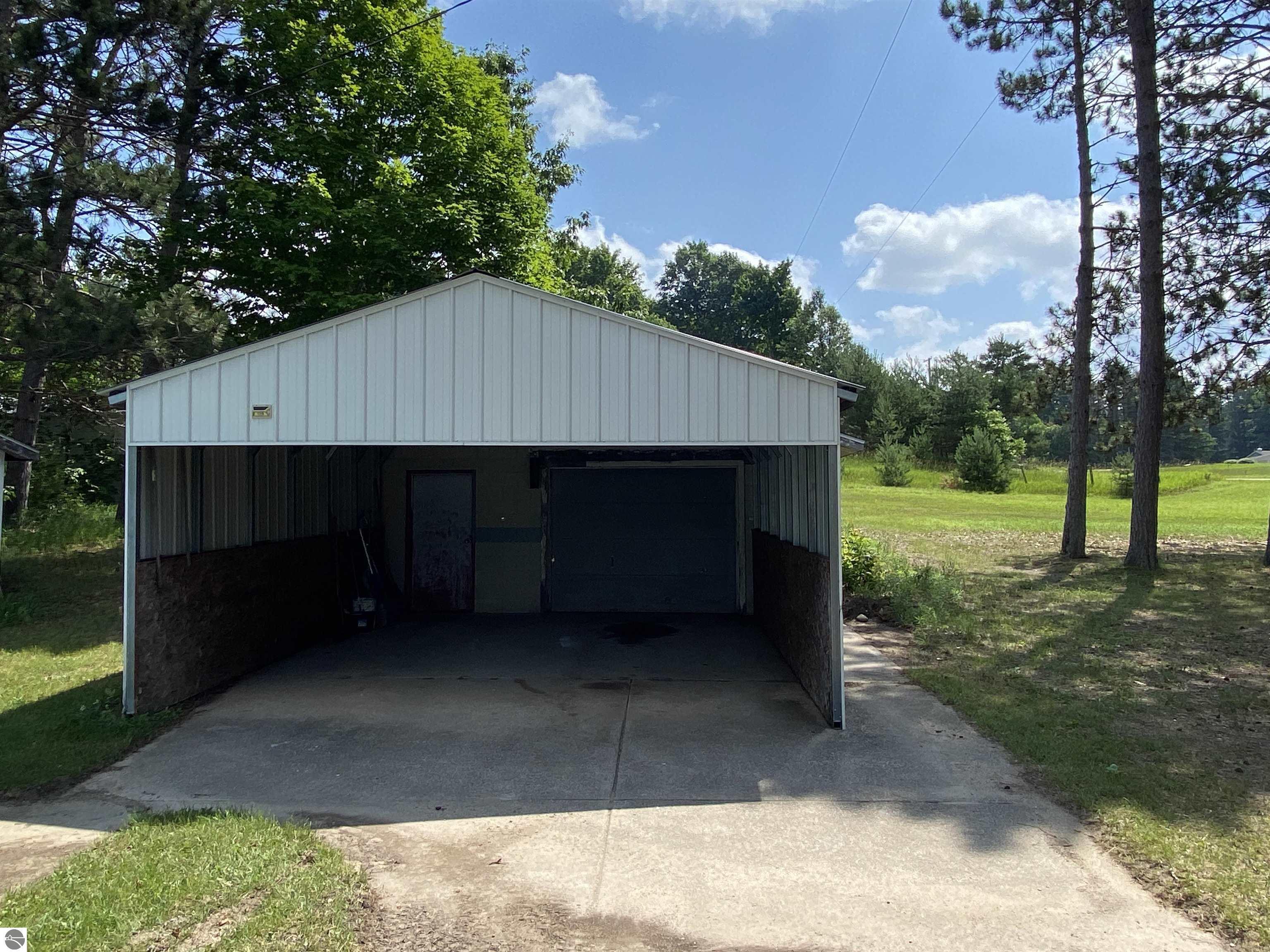 Property Photo: 7929 E 10 Road MI 49663-9740