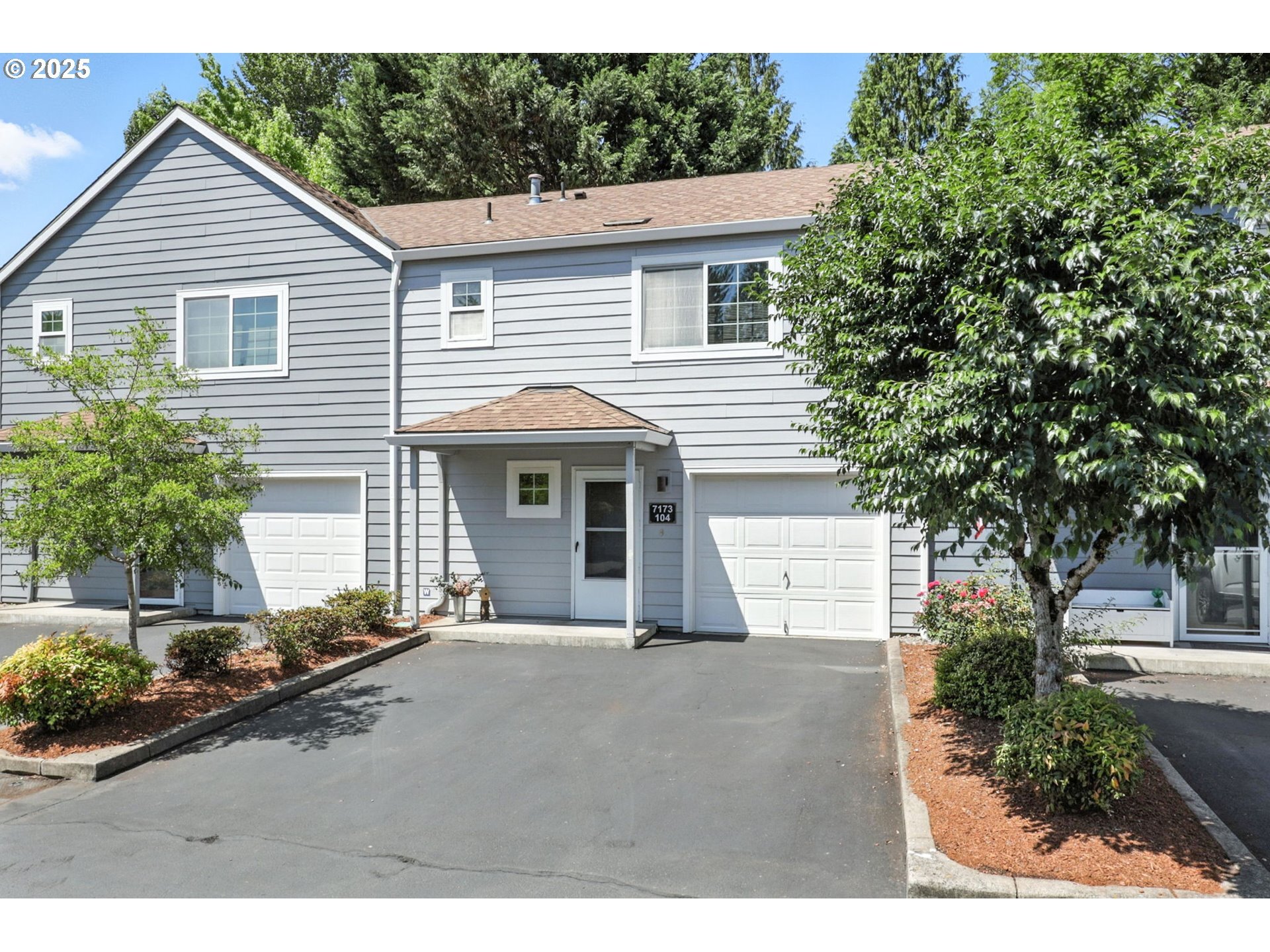 Property Photo:  7173 SW Sagert St 104  OR 97062 